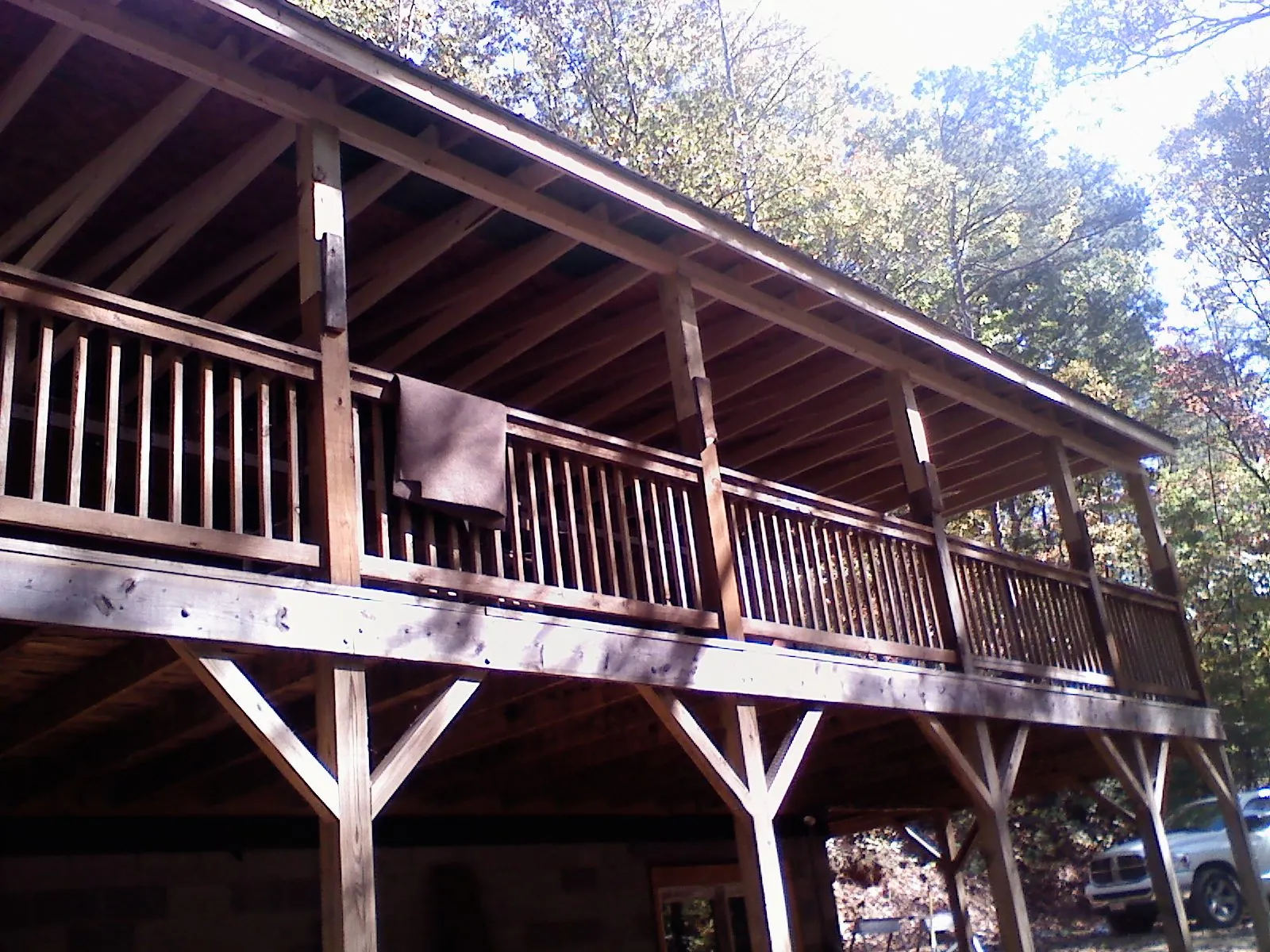 Timber framing under a new elevated porch and deck — Roof Leak Repair in Pemberton by Roofing Brothers